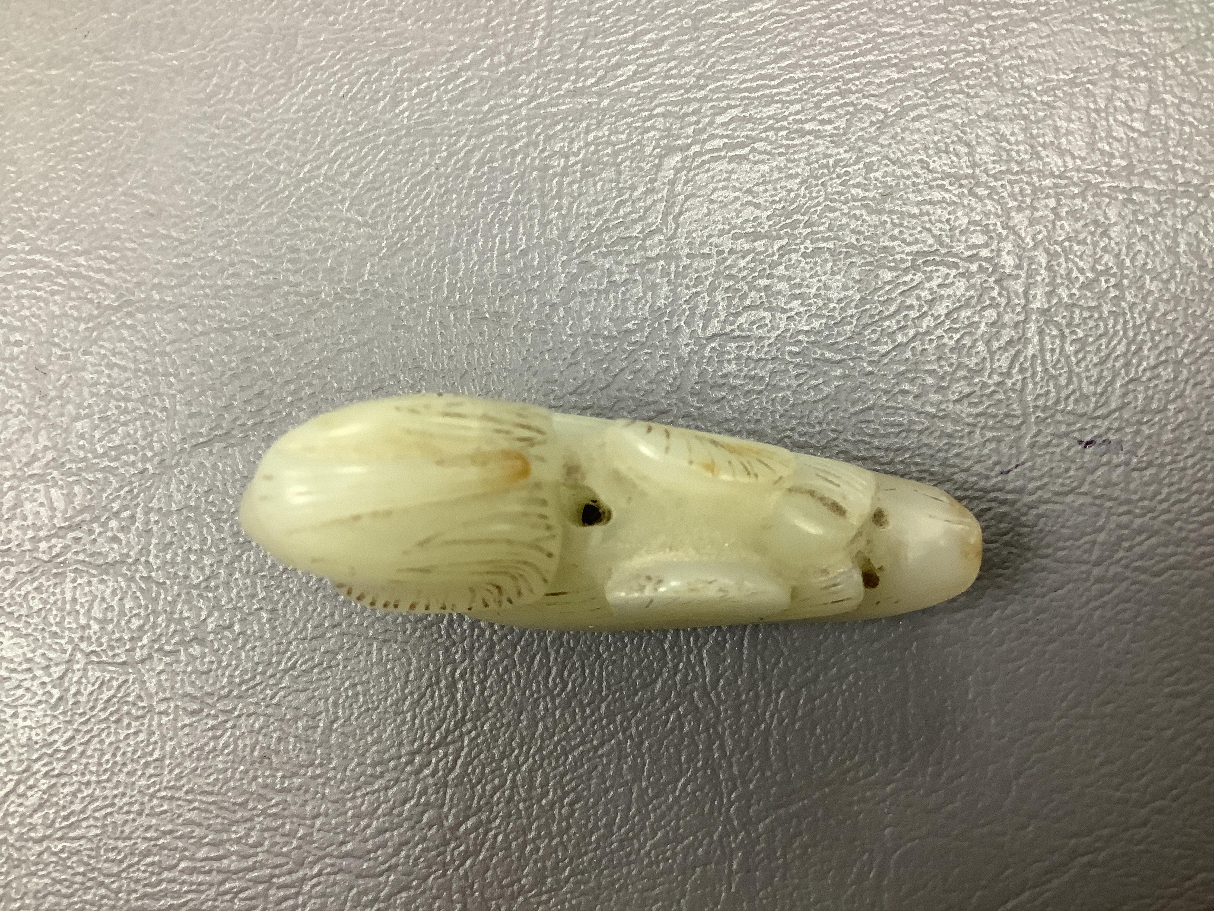 A Chinese jade figure of a Mandarin duck and a miniature pot and cover, three jadeite carvings and a bowenite dragon, 16.5cm